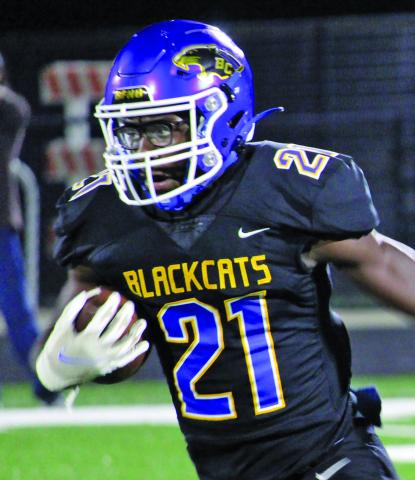 Sentinel photo/Mike Reddell Blackcat junior wide receiver Brice Turner (21) had team highs with 71 yards rushing with 59 return yards and two touchdowns. 