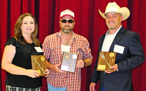 Sentinel photo/Mike Reddell Bay City Pilot Club held its annual "Celebrity Waiter" fundraiser and awarded plaques to the "waiter" who made the most in tips Thursday, Oct.14. From left: Melanie Bradley, third place; Bill Orton, first place; and Robert Lister, second place.