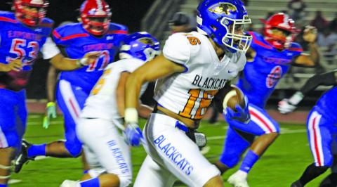Sentinel photo/Mike Reddell Blackcat junior wide receiver David Perez (16) finds an opening on a pass from quarterback Joel Davalos against Brazosport Friday, Oct. 8. Perez had a team-high 93 yards in receptions and a touchdown. 