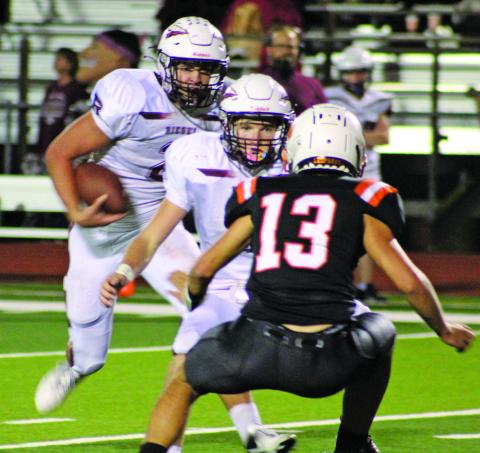Sentinel photo/Mike Reddell Leopard Austin Hill (13) sets up for the Riesel quarterback (with the ball) and his lead blocker.