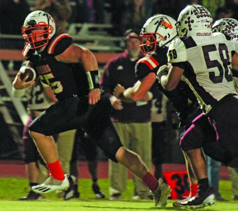 Photo/Anna Hernandez Van Vleck’s senior defensive end Garrett Chambless (55) Payton Brown (10) makes a touchdown run after intercepting an East Bernard pass.