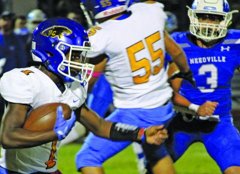 Sentinel photo/Mike Reddell Blackcat freshman running back Jada Andrews (1) tries to follow blockers against Needville last week.