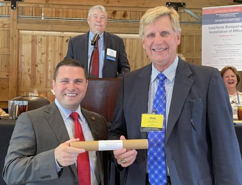 Contributed photo Matagorda County Judge Nate McDonald, right, accepts his Commissioners Court Advanced Curriculum Certificate of Achievement from Victoria County Judge Ben Zeller, 2020-21 president of the County Judges and Commissioners Association of Texas.