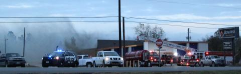 Photo/Anna Hernandez Area firefighters battle a fire that damaged the LynnGroup’s building on Texas 35 West, Wednesday evening, Nov. 24. The LynnGroup was ready to move into its new offices at the former Bowlera Fun Center after several months of renovation. The cause of the fire is still under investigation. Units responding included Bay City, Markham, Van Vleck and Midfield volunteer fire departments.    