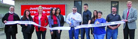 Sentinel photo/Jessica Shepard The Bay City Chamber of Commerce and Agriculture celebrated a grand opening and ribbon cutting for Justin Rhodes State Farm Friday, Jan. 7. The offices are located at 2409 Seventh St. in  Bay City.