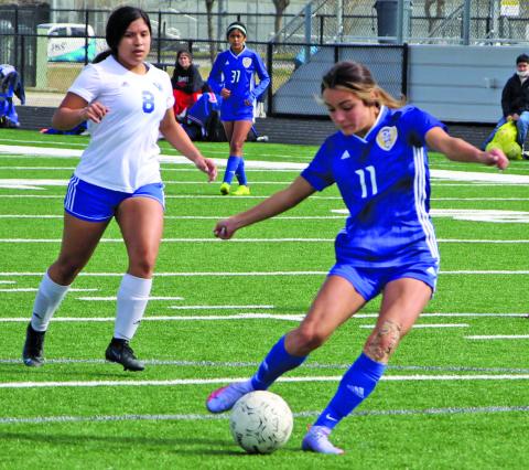 Ladycat Alyssa Castro prepares for a shot at the goal in the first half. Castro accounted for two goals.  Sentinel photo/ Mike Reddell