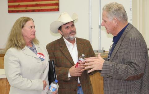 Sentinel photo/Mike Reddell Incumbent Precinct 4 JP Mark Finlay, right, visits with JP hopefuls Suzanne Sullivan (Precinct 2) and Jeff Elder (Precinct 6) following last week’s VFW politcal forum.