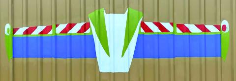  Photo/Zeinab Ghais Zeinab Ghais’ wings were painted at the Bay City Regional Airport. They incorporated their logo and “Buzz Light Year” inspired wings. Since they are always promoting events for children, the airport felt this was a great addition to their space, said Ghais.