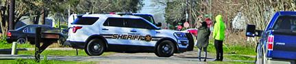 Sentinel photo/Jessica Shepard A Sheriff’s Department cruiser position on Second Street in Van Vleck Wednesday, March 23, as a search warrant ran by the DPS Tactical team looked for possible evidence in reference to the homicide that occurred in that area.