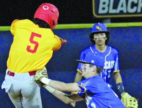 Blackcat Keaton Nunez seals an out after a Stafford player got caught in a rundown between third and second in last week’s district game with the Spartans. Stafford won the April 19 game 4-1 over the Blackcats. Bay City is 3-14-1 on the season and 1-9 in district play, putting them in sixth place. Anna Hernandez photo