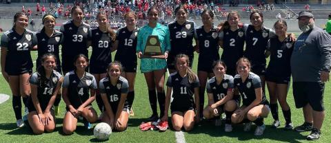 Photo/Anna Hernandez The BCHS Ladycat Soccer team displays their regional runner-up trophy for girls soccer conference this past Saturday, April 9th. The team finished the 21-22 season with 29 consecutive district wins.