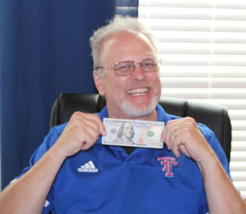 Sentinel photo/Jessica Shepard Tidehaven ISD Superintendent Dr. Andrew Seigrist won the 2021-22 Bay City Sentinel football picks title. Seigrist got 68% of his picks correct. Dr. Dane Simons came in second at 65%.