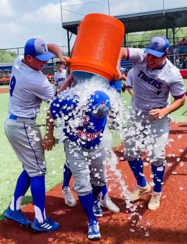 Courtesy photo Coach Eddie Russell gets iced down after the win.