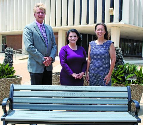 Sentinel photo/Jessica Shepard Matagorda County Judge Nate Mcdonald joins Bay City Main Street Program Manager Tina Israel and Bay City Community Development Executive Director Jessica Russell in the arrival of new benches for the corners of the courthouse plaza, Monday, May 9. 