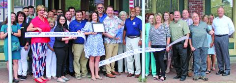 Sentinel photo/Jessica Shepard Fat Grass Restaurant & Bar celebrated its re-opening ribbon cutting Thursday, June 28. The restaurant will now be open for lunchtime Tuesday-Saturday and feature brunch on Saturdays. 