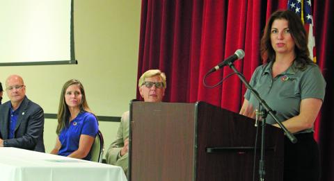 Sentinel photo/Jessica Shepard HIF Chief Operations Officer Brooke Vandygriff, right, presented a PowerPoint informational session on HIF's plans for its Matagorda County eFuels production facility on Aug. 30. Vandygriff explained that the company was concentrating on on-site work at the moment but would pursue beginning construction in 2023.