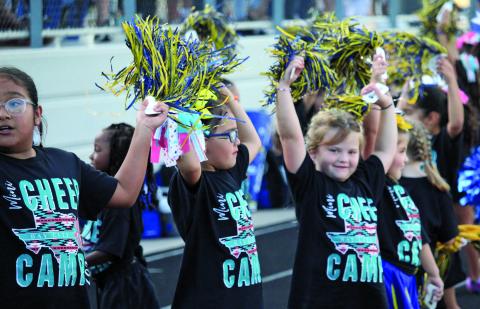 Sentinel photo/Mike Reddell Tenie Holmes Blackcat Cheerleaders support the Bay City team in its victory over Sealy Friday night, Sept. 16. 
