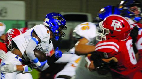 Sentinel Photo/Mike Reddell Blackcat junior running back Paris Fox (14) gets behind his blockers, including Marco Mata (76) for a gain against El Campo.