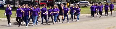 Sentinel Photo/Mike Reddell  Walk a Mile in Their Shoes was a mile-long walk from the Crisis Center to the courthouse Wednesday, Oct. 12. The Crisis Center-sponsored event was to bring awareness to domestic violence. At the courthouse there were guest speakers and a moment of silence.