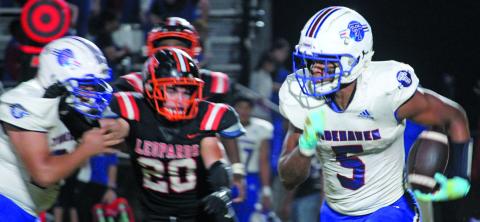 Sentinel Photo/Mike Reddell Tidehaven’s Joseph Dodds (5) picks up yards around end against the Leps.