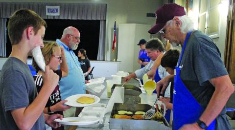 District Attorney Steven Reis' Mickey Mouse pancakes are always a hit with children at the Boys & Girls Club of Bay City and Matagorda County's "Annual Pancake Supper" on Nov. 10.  Sentinel Photo/ MaLinda Reddell