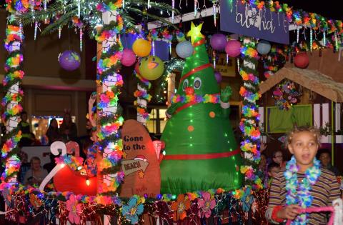 Sentinel Photo/MaLinda Reddell Over 60 decorated and lit Christmas parade entries drew dozens downtown Friday, Dec. 2. The annual "Lighted Christmas Parade" was part of the two-day "HomeTown Christmas" event sponsored by the City of Bay City Parks and Recreation Department.. 