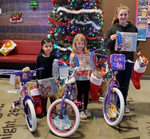 Sentinel Photo/MaLinda Reddell This year's Sentinel Christmas Coloring Contest winners are, from left, Denisse Palomares, Ruby Bonnot, and Ellasyn Milliff. Each girl received a bicycle, a blue ribbon for their artistry, and a Christmas stocking full of candy and other treats.