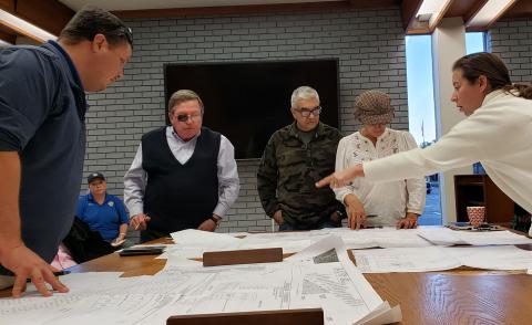 Sentinel Photo/Jessica Shepard Planning Commission board members review large-scale plans for subdivision plats before approving them Dec. 15. 