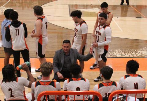 Photo by Anna Hernandez Leopard Head Basketball Coach Billy Ramey talks to his squad in last week’s 52-42 win over Brazos, Friday, Jan. 20. The Leopards are 11-8, 6-1 and second in District 24-3A-2.