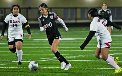 Bay City Lady Cat soccer No. 20 moves the ball in a recent 9-0 victory against El Campo.  Last week, the girls beat Hallettsville 10-0 at home Jan. 30, and Rice, by a like score, there Friday, Feb. 3. The girls were to play Columbus Monday (past the Sentinel’s press time). Going into that game, the Lady Cats were 12-2, 4-0, and first in District 22-4A-1. Courtesy photo
