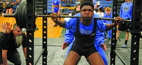 Sentinel Photo/Mike Reddell Bay City powerlifter is Zion Sanders - 165 class - exerts on this lift at the BCHS powerlifting meet Saturday, Feb. 11.