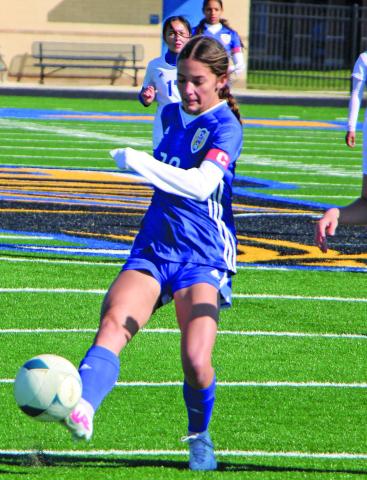 Sentinel Photo/Mike Reddell Bay City Lady Cat soccer (14-2, 6-0) shut out Wharton 8-0 at Memorial Stadium Saturday, Feb. 11 and was to play Palacios Monday, Feb. 13 - past the Sentinel’s press deadline. Senior forward Judah Breazeale (20) takes a shot at goal against Wharton. Bay City girls are first in District 22-4A-1.