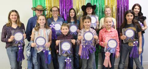 Sentinel Photo/Jessica Shepard Matagorda County Fair and Livestock Association's Home Economics food entry winners received purple rosettes for their win as Grand Champions of their chosen divisions Saturday, Feb. 25. Winners include Jase Alford, Analyn Sutherland, Ellie Curtner, Abigail Jurek, Clara Dodd, Karoline Murray, Jace Reynolds, Aribella Carson, Marley Kennedy, Jace Girndt, Victoria Sliva, Jasmine Anderson, Audrey Delgado, Shawn Sneath, Savannah Remmy, and Ava Bowers.