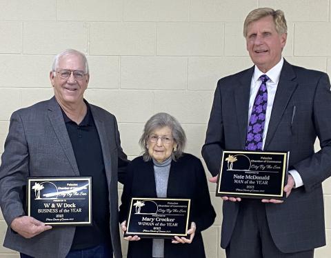 Photo/Carol Ferdinand At the recent Palacios Chamber of Commerce annual banquet, the honorees included, from left: Business of the Year Craig Wallis, owner of W & W Dock; Woman of the year Mary  Crocker; and Man of the Year Nate McDonald.
