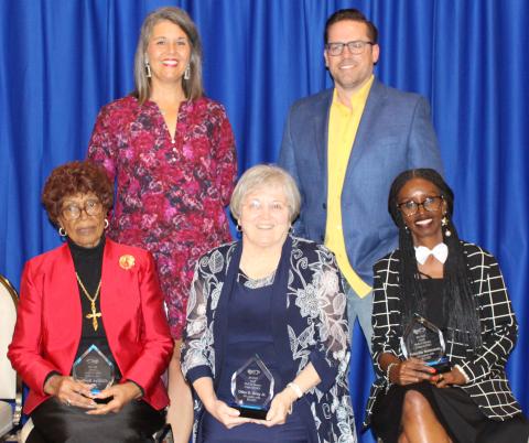 Sentinel Photo/Jessica Shepard Gladys Beller Spiller, the late Otha D. Gray, Jr., and Priscilla Robinson were honored for their commitment to Bay City ISD and their service as educators at BCISD's annual Employee Appreciation Banquet last Thursday. Gray was represented by his wife Jeanne, center, for the award, with Bay City ISD Trustee President Jill Westmoreland and Trustee Trent Tinnin, back.