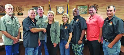 Sentinel Photo/Jessica Shepard Van Vleck ISD trustees unanimously approved hiring Christie Dement, center, as the new Superintendent of Schools during their regular meeting Monday night. 