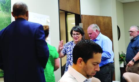 Sentinel Photo/Jessica Shepard Bay City Community Development Corporation board members participated in a strategic planning workshop Monday afternoon. The board reviewed and named the possible strengths, weaknesses, opportunities, and threats that face economic development and the city itself. 