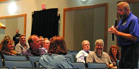 Sentinel Photo/Jessica Shepard Bay City ISD Superintendent Dr. Dwight McHazlett, right,  spoke to over 30 audience members about the district’s desire for more community partnerships and how the district was meeting its LSG goals last Thursday.