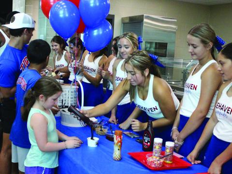 Sentinel Photo/Jessica Shepard Tidehaven Athletic Booster Club hosted an ice cream social to kick off the start of fall sports season last Wednesday, July 26.