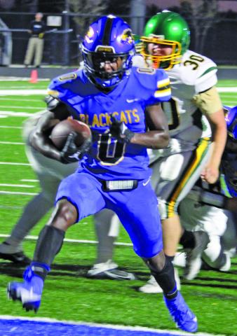 Sentinel Photo/Mike Reddell Bay City junior running back Jada Andrews scores - one of his three touchdowns. Andrews had 198 yards rushing. 