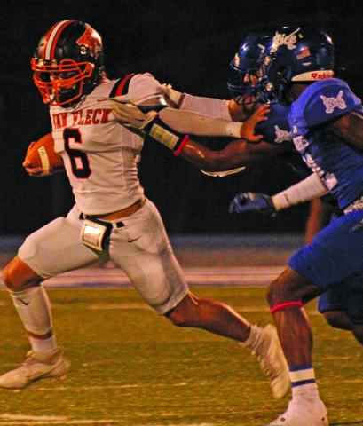 Anna Hernandez photo Lep running back Brett Noster (6) stiff arms a Rice defender.