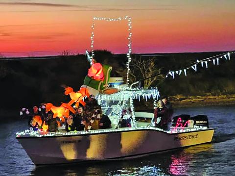 The  Matagorda Christmas Lighted Boat Parade looped around Matagorda Harbor a couple of times on Friday, Nov. 24.