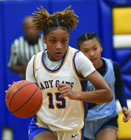 Larry Bose photo  Bay City senior Ladycat Khylee Perry dribbles down court in a recent game. The Ladycats won the Silver  Division Championship at the Rockport-Fulton Tournament on the Coast. The Ladycats 7-7 were to play Van Vleck Tuesday.  