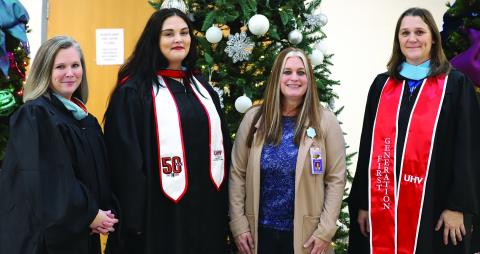 BCISD photo In the photograph (left to right): Amanda Slater, Lacy Woods, MaryLynn Mosier Flores (BCHS principal), and Becky Morrison.