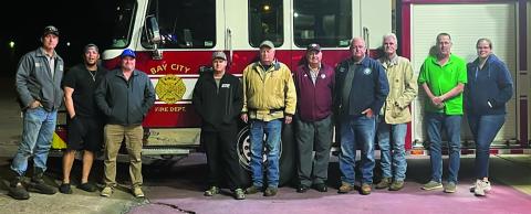 Courtesy photo John Miller, Medical Service Manager, visited the Bay City Volunteer Fire Department Nov. 28, to donate 1,000 feet of fire hose on behalf of Tenaris in thanks to all of the volunteer firefighters who keep the community safe.
