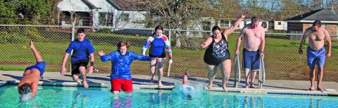 Sentinel Photo/Mike Reddell Eleven Bay City residents braved the cold temperatures on Saturday, Jan. 6, to take the 8th Annual  Polar Plunge at Hilliard Pool. The air temp was 48 degrees with a water temp of 58 degrees. Adults participating were: Jessica Mach, Ben Flores, Anna Flores, Erin Mach, and Terry Myren. Those under 18 were: Kai Castillo, Nadia Flores, Alexander Mach, Daphene Mach, Ian Wilson and Ivy Wilson.