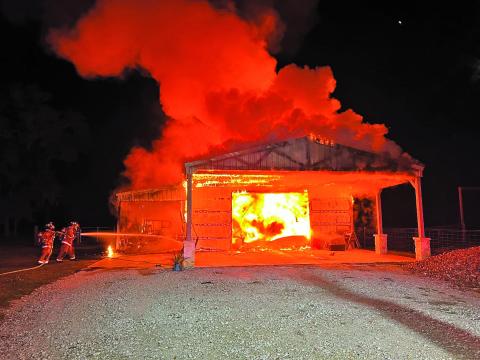 Fire Marshal Dan Shook Firefighters battle a barn fire caused by fireworks on New Year’s Eve near Van Vleck.