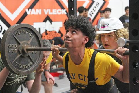 Photos by Anna Hernandez Senior Bay City powerlifter Yahir Amezquita strains at the Van Vleck powerlifting meet Feb. 8.