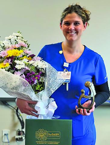 Contributed photo Nurse Sara Hartsfield receives MRMC’s first DAISY award.