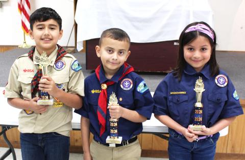 Sentinel Photo/ Jessica Shepard With the help of several anonymous judges, three winners were chosen at Cub Scout Pack 4545's annual cake auction fundraiser last Friday. Those three category-based winners are from left Liam Moya, Emerson Morris, and Frida Galvan - who placed in Most Unique, Judge's Choice, and Best Cubscout Theme respectively. 